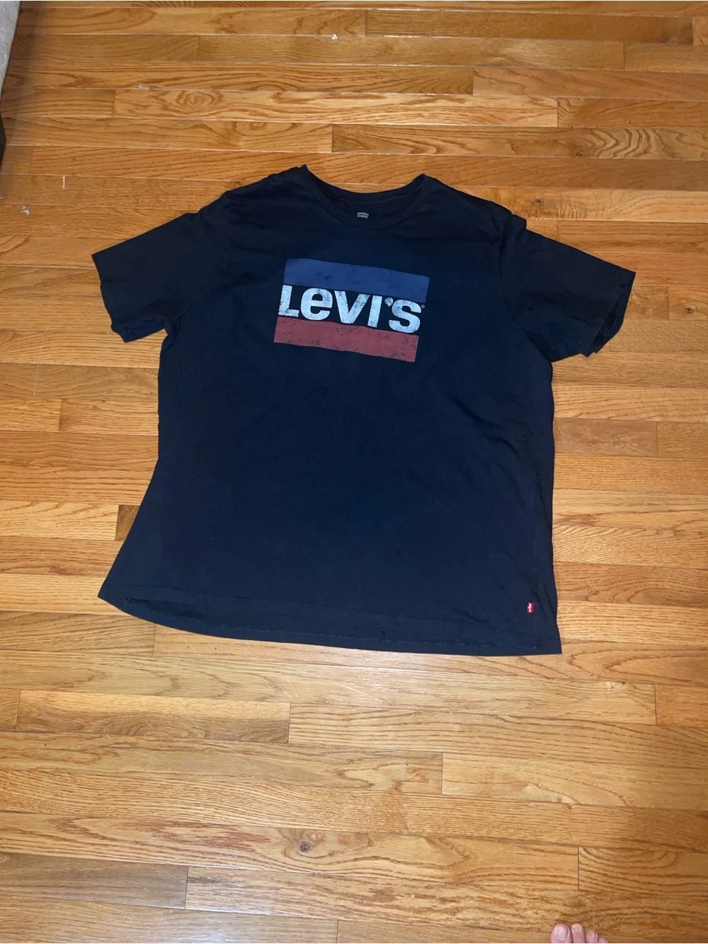 Levi's Black Short Sleeve Graphic Logo Tee with Blue & Red Accents